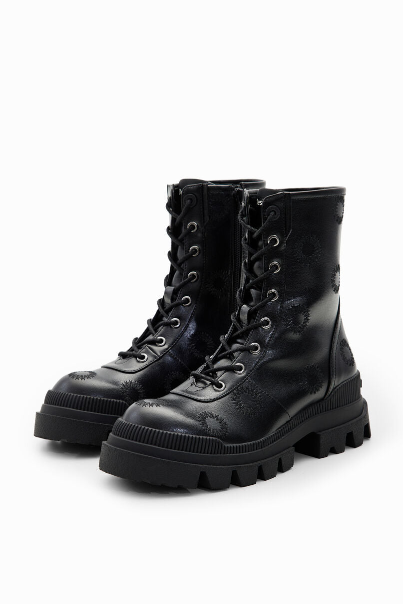 Embroidered track-sole boots